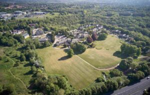 drone view of hesslewoodf office park, showing the offices, parkland, and surrounding trees and infrastructure