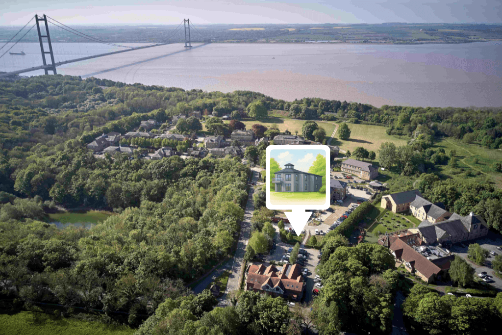 Aerial view of Hesslewood Office Park, A collection of office buildings in a parkland setting. View of River Humber and Humber Bridge in image horizon.